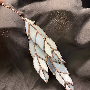 3 copper feathers